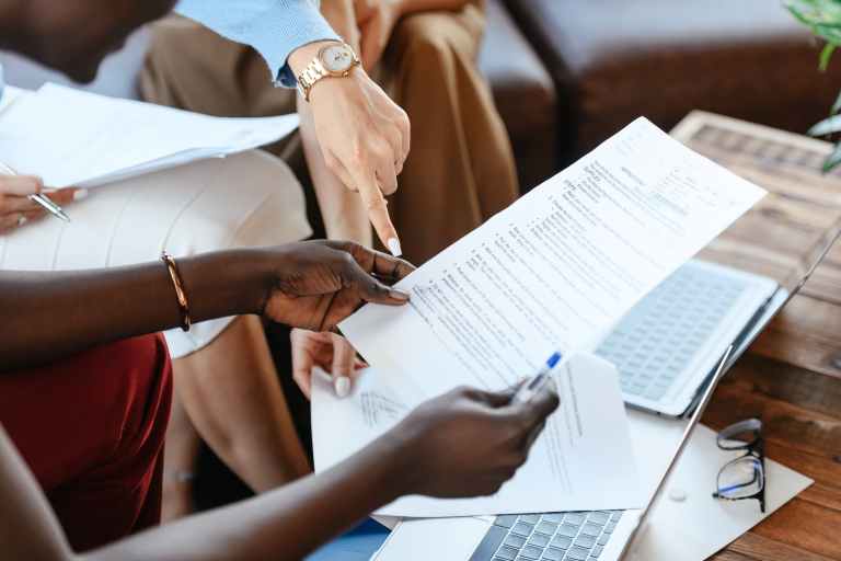 Which are the trade license categories eligible for 100% foreign ownership in Dubai?