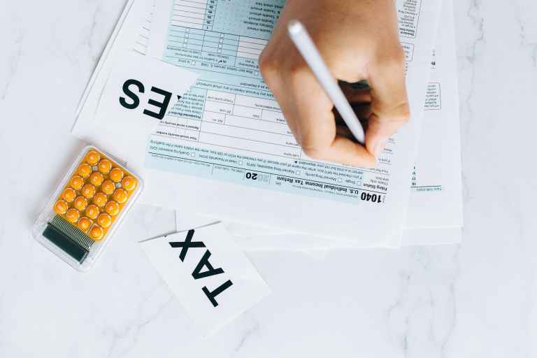 How to navigate taxation policies and regulations in SAIF Zone?