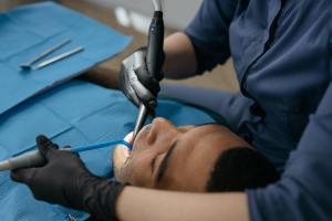 close up shot of a person having dental checkup